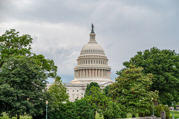Naklejka premium United State of America wallpaper, Capital Hill building with dark clouds