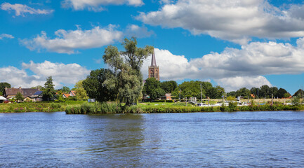 Beautiful river Maas landscape with ancient countryside village - Batenburg, Netherlands (Noord-Brabant), (focus on center)