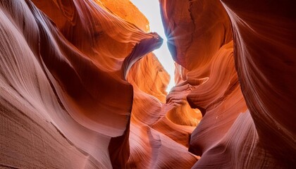 cardiac slot canyon in arizona shows the smooth intricate patterns and shapes formed over thousands of years from flash flooding