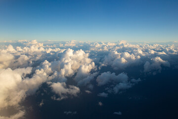 beautiful thick clouds in the sky from the height of the plane