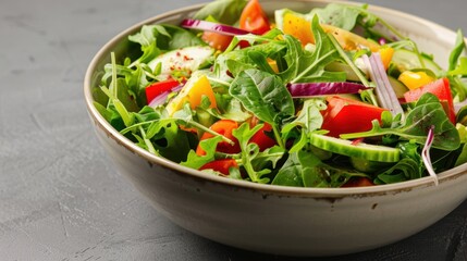 A vibrant and fresh salad bowl filled with colorful vegetables, perfect for a healthy meal or recipe inspiration.