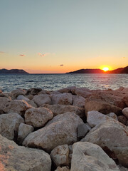 beautiful dramatic landscape of sunset on the sea beach