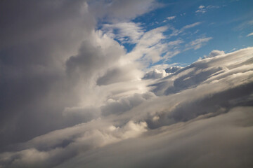 beautiful thick clouds in the sky from the height of the plane