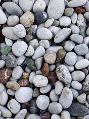 close up of pebble stones on a rocky beach