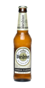 Bottle of Warsteiner brand German Pilsener Premium beer on transparent background PNG