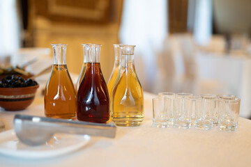 bottles with alcoholic beverages on the buffet table
