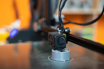 close-up of the print head of the 3D printer