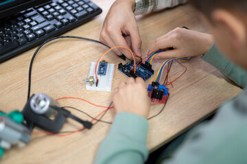 an engineer is engaged in the development and layout of electrical circuits
