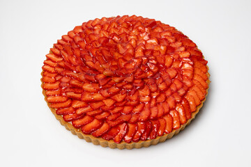 Strawberry tart on white background, top view