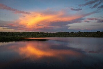 Evening Sunset over Amazon Rainforest Lake