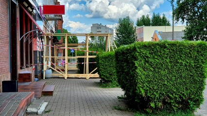 Construction Site With Wooden Frame In Front Of A Building In The City