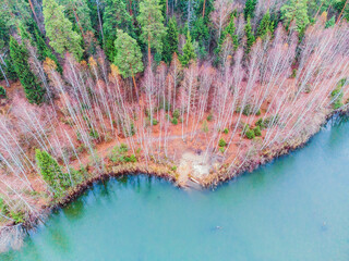 Aerial view of blue lake and autumn forests