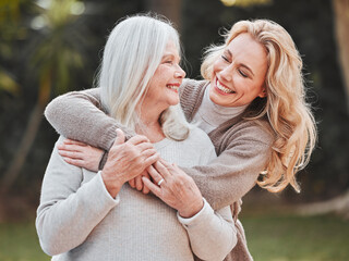 Embrace, woman and senior mom in garden with smile, pride and gratitude in outdoor bonding together. Happy family, generation and elderly mother with daughter in backyard for hug, support and love