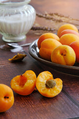 yellow ripe apricots on a plate
