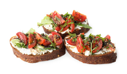 Delicious bruschettas with ricotta cheese, tomatoes and arugula isolated on white