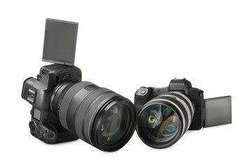Fototapeta premium Modern cameras isolated on white. Photographer's equipment