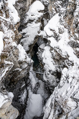 Looking down inside Marble Canyon, Kootenay National Park frozen during winter.
