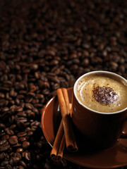 Cup of Coffe Latte on Coffee Beans