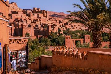 Kasbah Ait Ben Haddou, a UNESCO site in Morocco, features stunning clay architecture, narrow alleys, and historic kasbahs, offering panoramic views and cinematic charm.