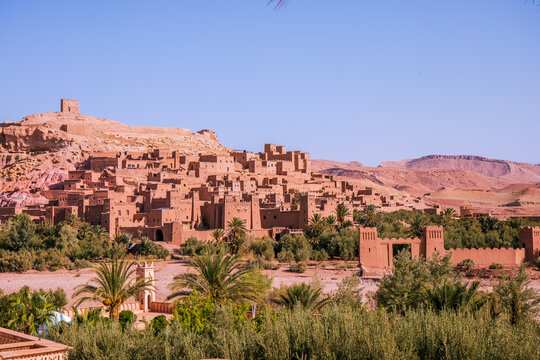 Kasbah Ait Ben Haddou, a UNESCO site in Morocco, features stunning clay architecture, narrow alleys, and historic kasbahs, offering panoramic views and cinematic charm.