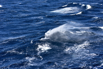 Naklejka premium Big waves at open sea. Summer monsoon in Indian Ocean