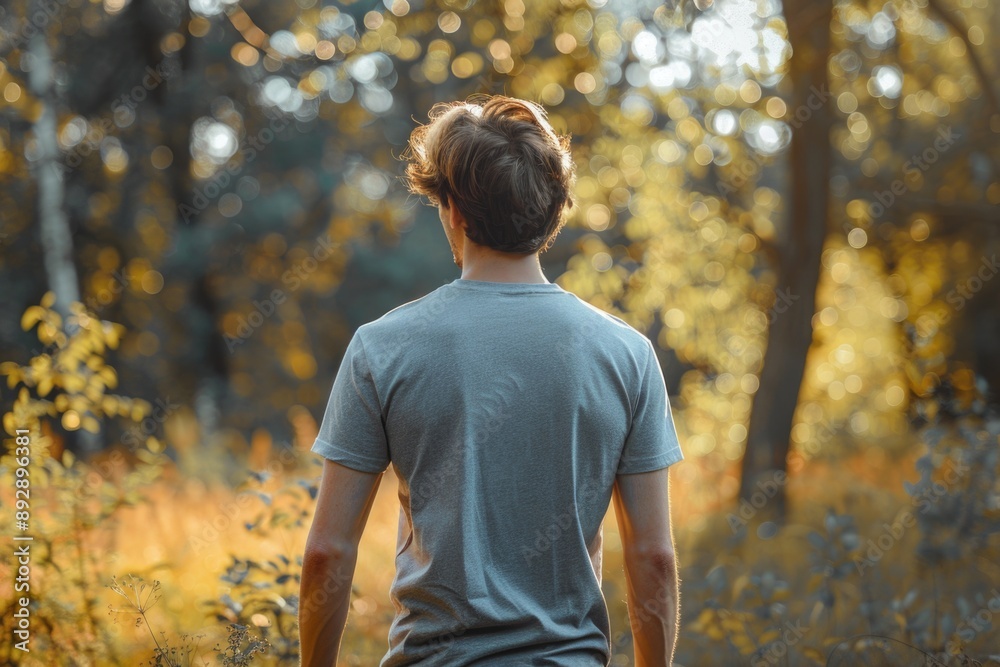 Aufkleber A person navigating through a dense area of high grass, possibly searching for something or escaping from somewhere