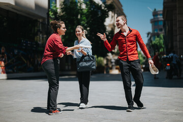 Group of young businesspeople meeting outdoors for an engaging conversation. Dressed in casual wear discussing work matters on the street.