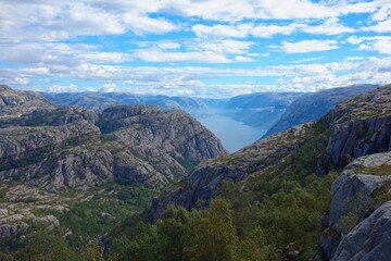 Naklejka premium Hiking to Pulpit Rock, a location with views over the Lysefjord, involves a 4-5 hour hike with stunning views of the fjord