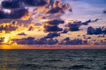 Dramatic sky background. Dark stormy cloudy sky. Sunset seascape with dramatic sky. Cloudy sky over sea.