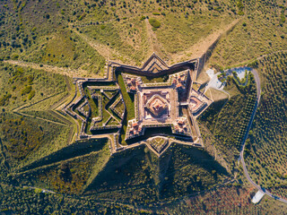 Aerial view of star-shaped fortification of Nossa Senhora da Graca Fort in village of Alcacova,...