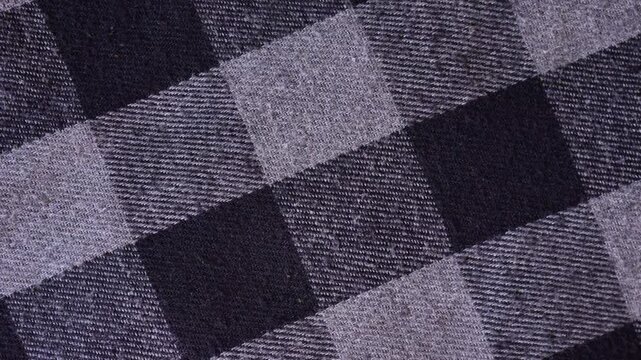 Rotating plaid flannel fabric. Checkered flannel cloth rotate clockwise