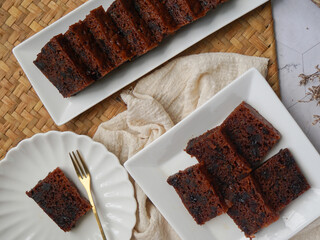 Kek Buah Kukus, a traditional Malaysian steamed fruit cake filled with dried fruits, nuts, and spices