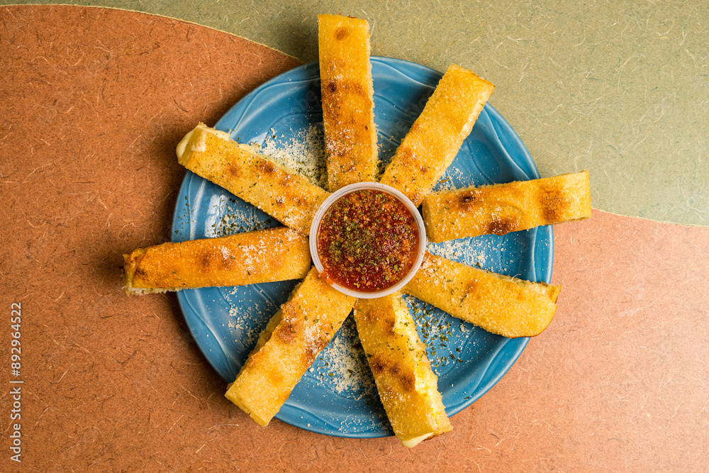 Poster bread sticks with marinara sauce