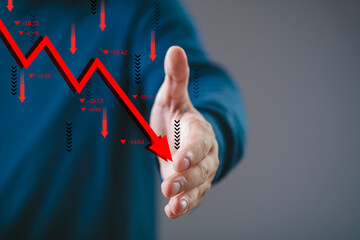 Businessman offering handshake with declining chart symbolizing business failure, financial crisis, or economic recession.