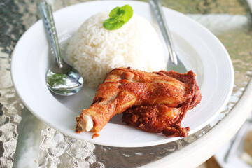 Hot steamed rice and fried chicken