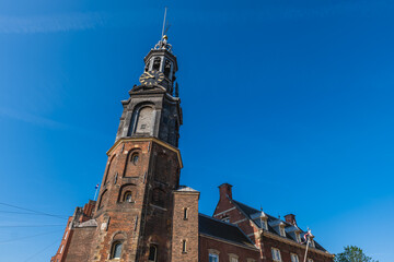 Obraz premium The Munttoren or Munt, is the Mint Tower located on Muntplein square in Amsterdam, Netherlands