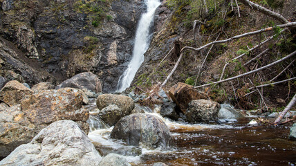 The Copper Mine Falls, located near York Harbour in Newfoundland, Canada, are conveniently accessible via a brief walk from Route 450, also referred to as Captain Cook's Trail.
