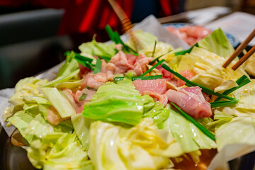 Close up shot of delicious chicken paper hot pot