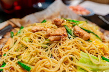 Close up shot of delicious chicken fried noodle