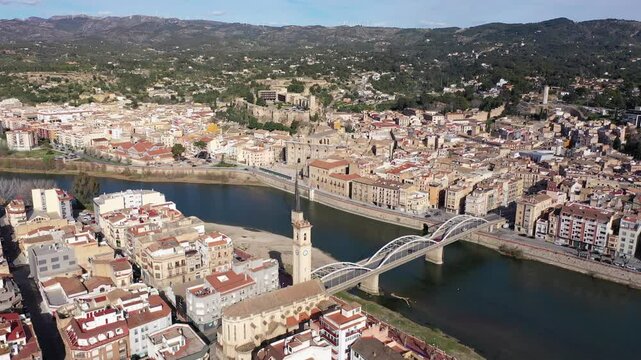 Cityscape of Tortosa, comarca of Baix Ebre, Catalonia, Spain. View of residential buildings along Ebro River.
