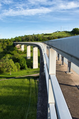 Bridge on a sunny spring evening with blue skies in Rhineland Palatinate, Germany.