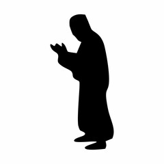 silhouette or illustration of a Muslim praying