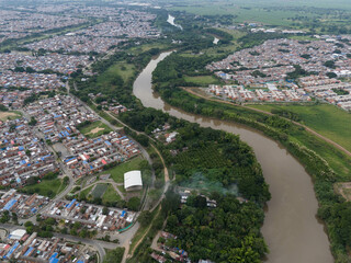Aerial views of the Cauca River in eastern Cali, Colombia