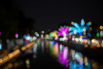 blurred bokeh of night street and river background