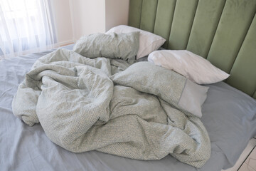 messy bed in early morning , messy bed after waking up 