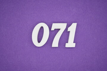 The numbers are made of white paint wood, placed on the background as a purple paper.