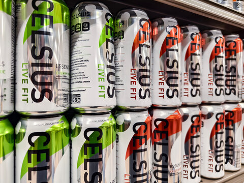 Celsius energy drinks on supermarket shelf in various flavors