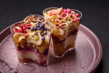 Delicious nutritious vegan dessert trifle with berries, cheese cream