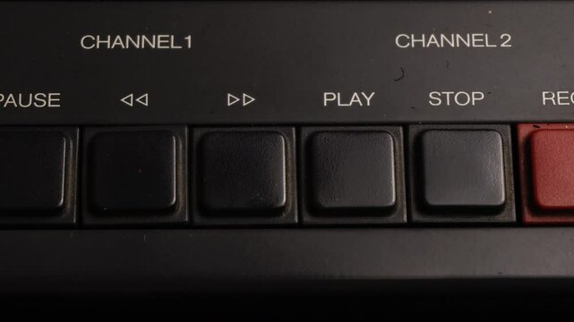 Command Buttons on Professional Reel-to-Reel Audio Recorder, Stopping and Rewinding Tape, Close Up