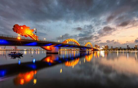 Dragon bridge in Danang at sunset which is a very famous destination for tourists